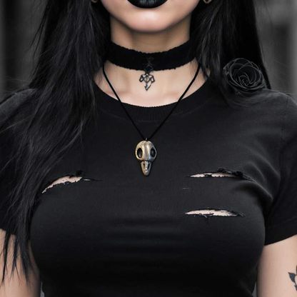 Handmade ceramic raven skull necklace on black cord